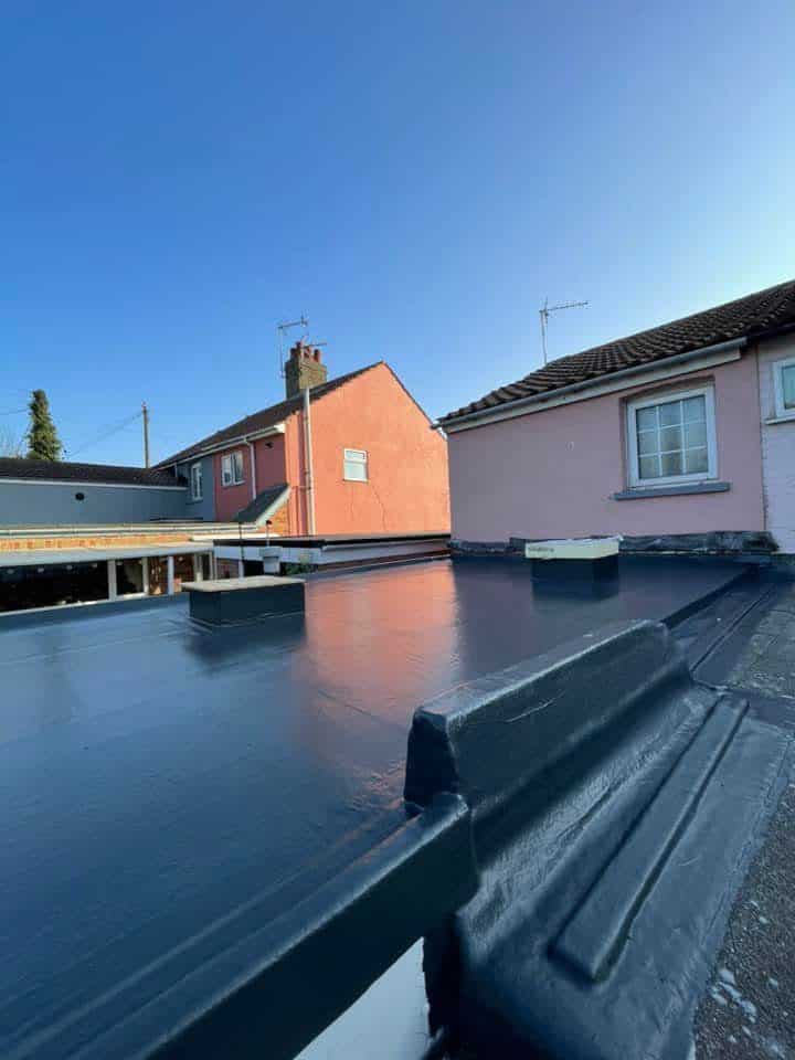 New flat roof installation by 360 Renovations and Builders, UK roofing specialists.